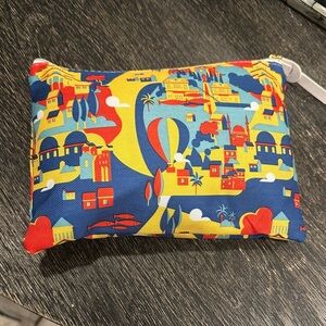 Colorful Travel-Themed collectible Airport Pouch with flight essentials